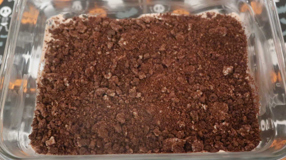 Chocolate mousse topped with the orea dirt cake topping