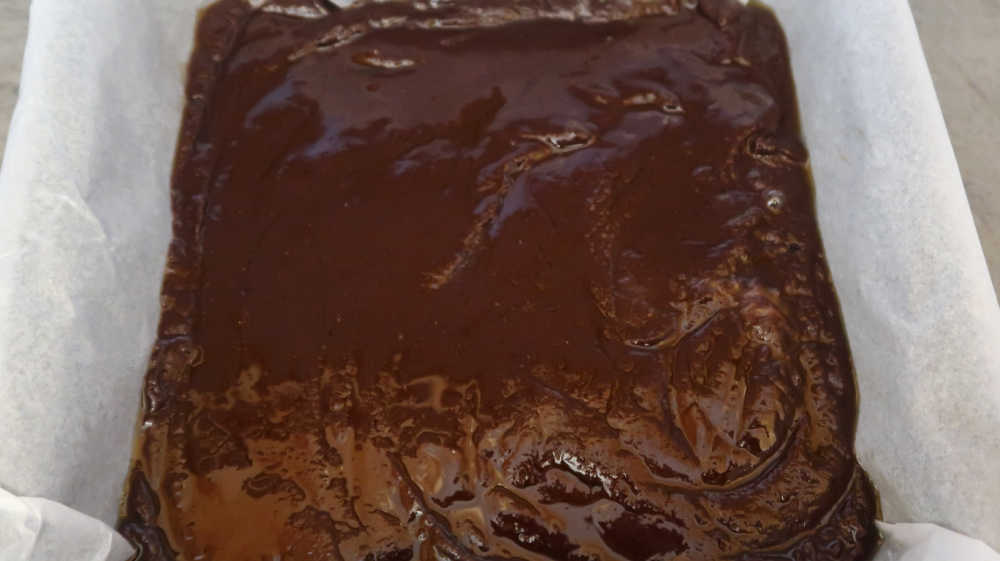 Brownie batter in the baking tin ready for the oven.jpg