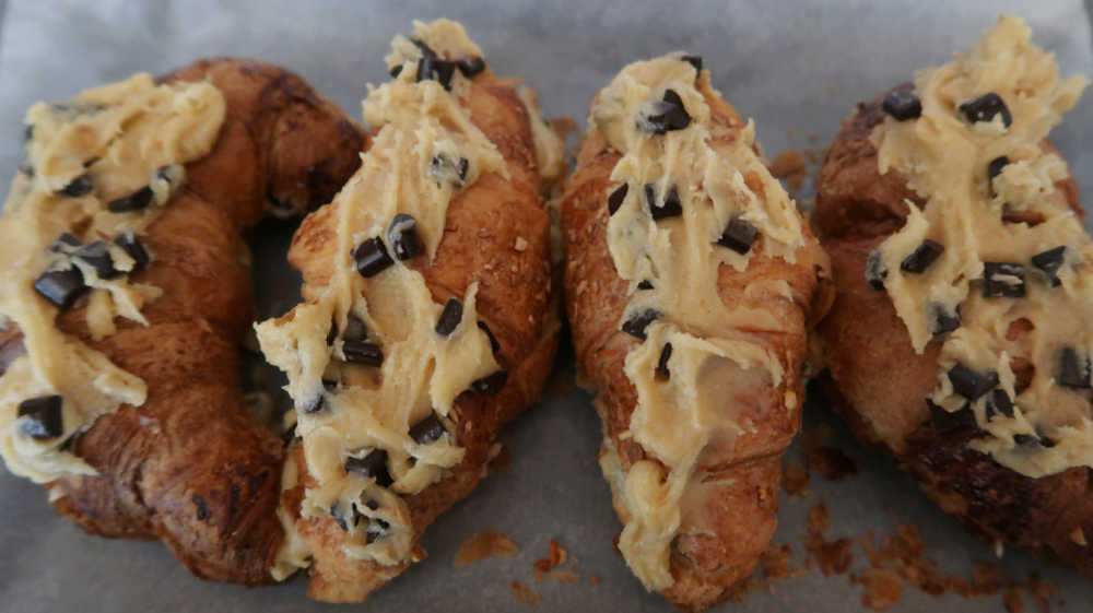 Croissant filled and topped with cookie dough