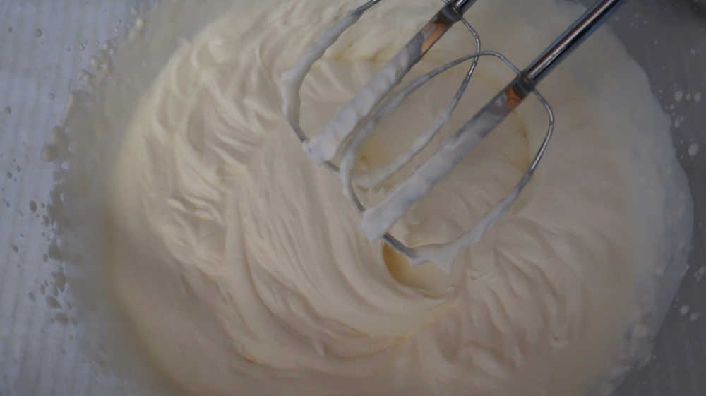 Homemade whipped cream in a large bowl