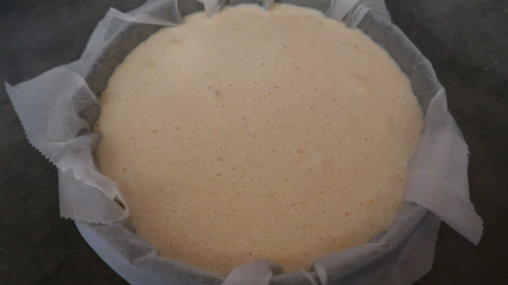 The cheesecake batter in the bakin tin ready for the oven